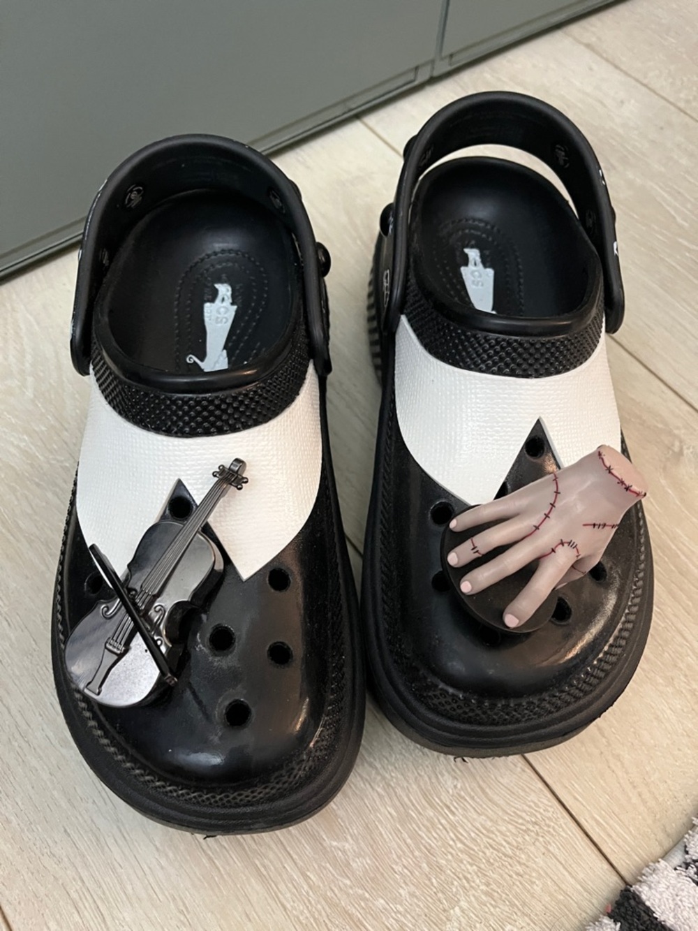 “Wednesday” CROCS Black and White Novelty Charm Clog Mules with Violin and Hand